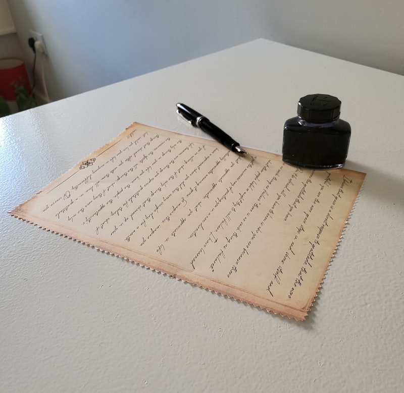 Handwritten letter on vintage paper with fountain pen